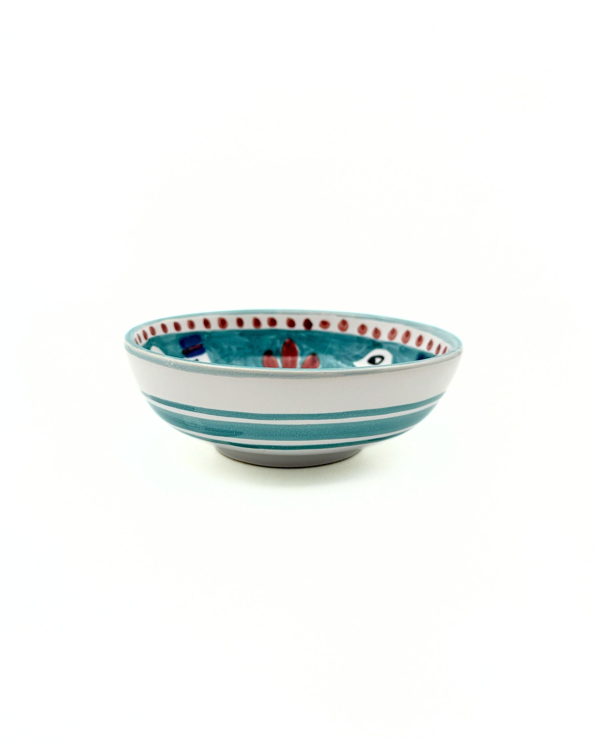Dipinto Ceramics Amalfi liten bolle, skrått ovenfra. Turkis kant, hvite striper og fargerikt blomstermønster inni