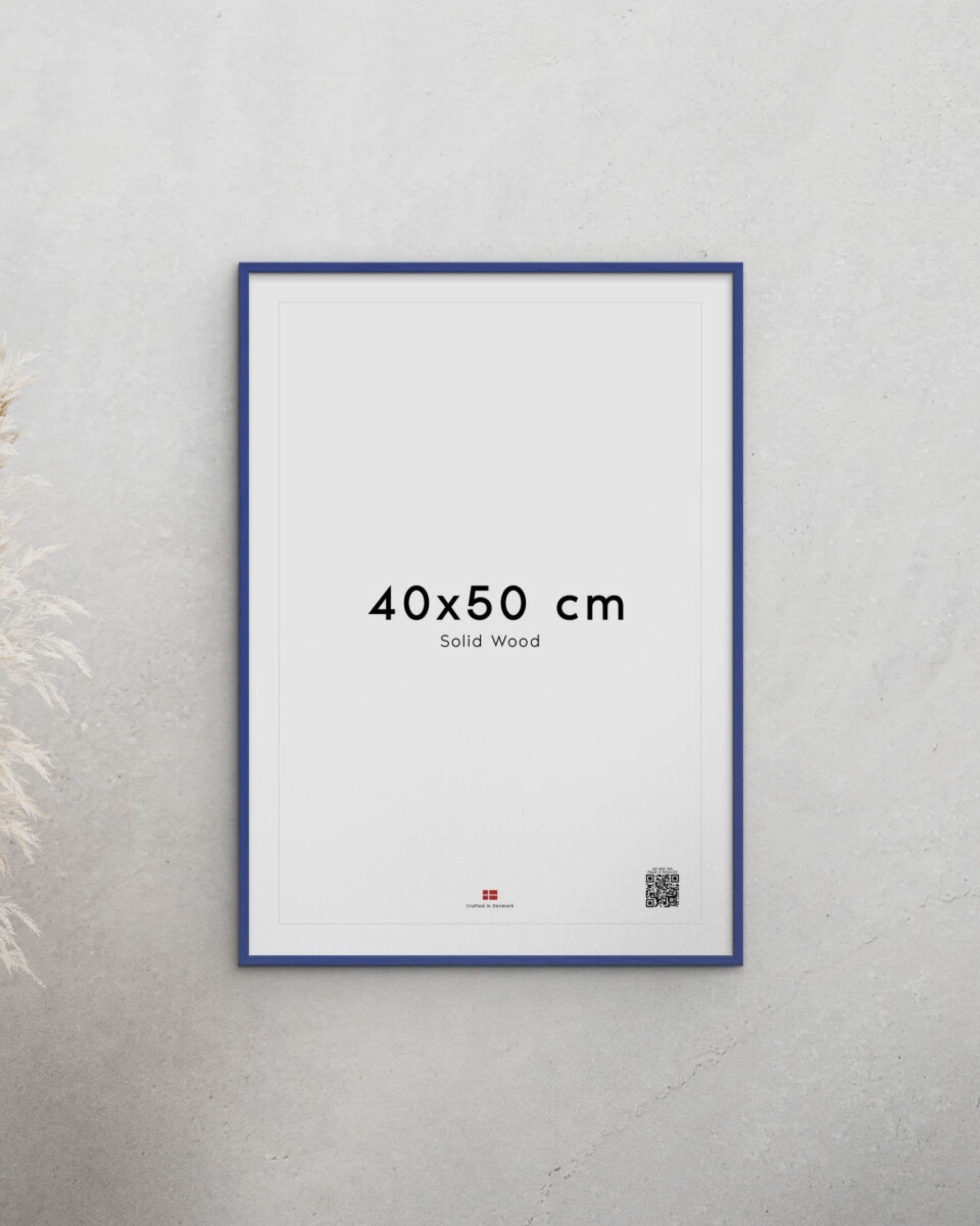 Blå bilderamme i heltre og glass fra Poster & Frame