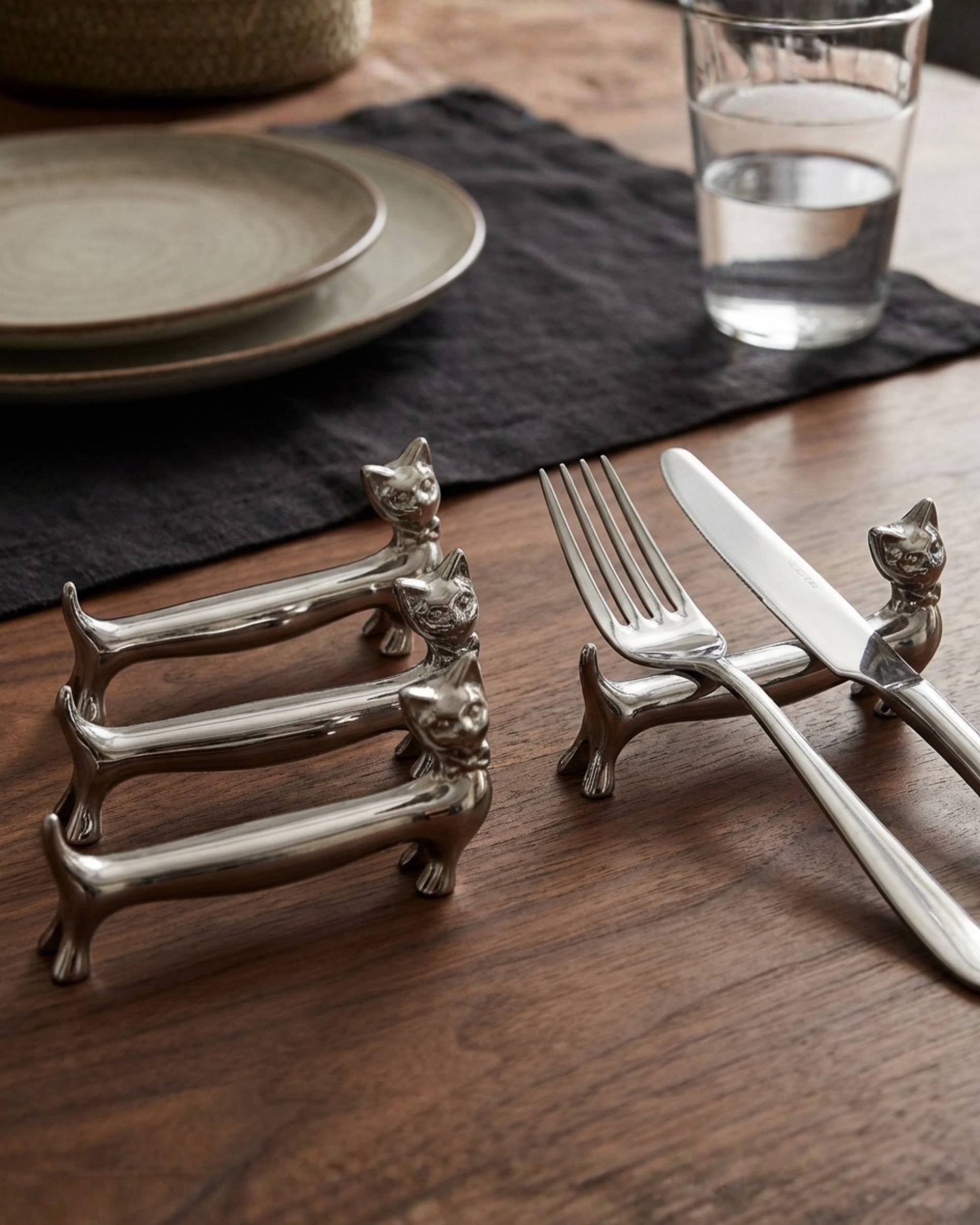 KATT Sett a 4 bestikkhvilere i rustfritt stål