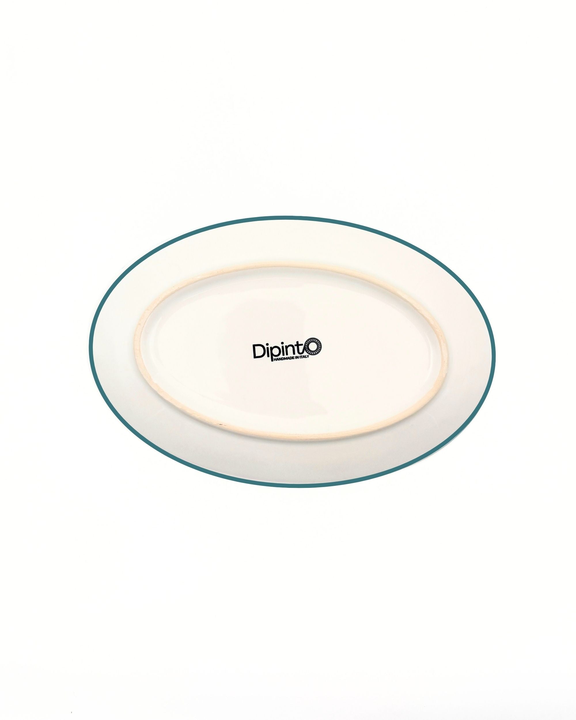 Baksiden av Dipinto Ceramics Linea Ovalt fat, hvit keramikk med mørk blå kant, "Dipinto Handmade in Italy" logo
