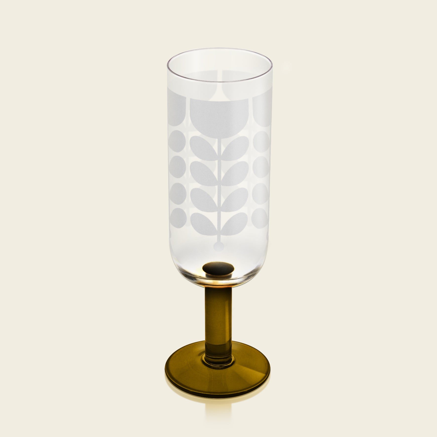 Oker farget champagne glass fra Orla Kiely